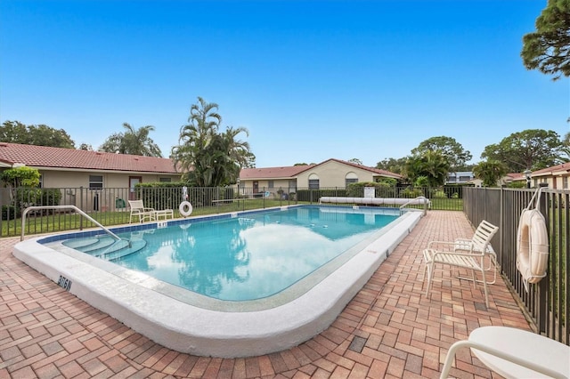 view of pool with a patio area