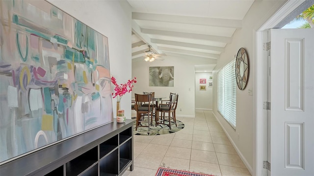 corridor featuring vaulted ceiling with beams and light tile patterned flooring