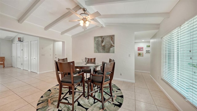 tiled dining room with lofted ceiling with beams and ceiling fan