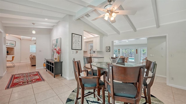 tiled dining area with vaulted ceiling with beams and ceiling fan