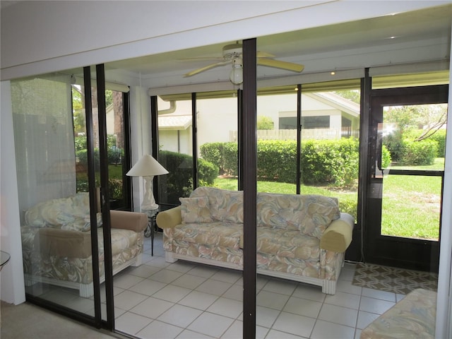 sunroom / solarium with ceiling fan