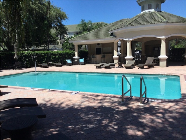 view of pool featuring a gazebo and a patio area