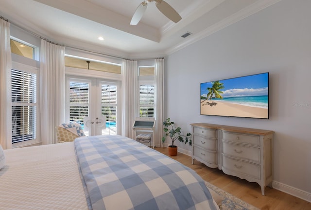 bedroom with access to exterior, ceiling fan, french doors, light hardwood / wood-style floors, and ornamental molding