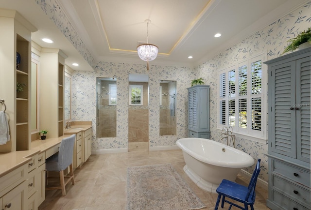 bathroom featuring vanity, a tray ceiling, separate shower and tub, crown molding, and an inviting chandelier