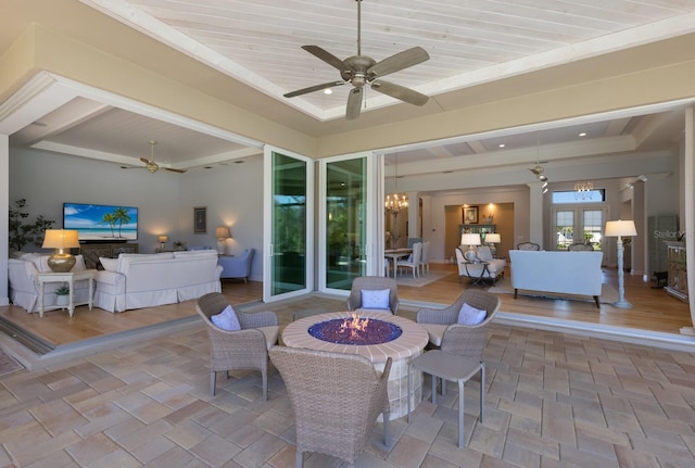 view of patio / terrace featuring an outdoor living space with a fire pit