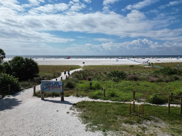 property view of water featuring a beach view