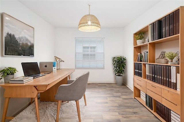 office area with wood-type flooring