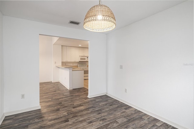 interior space with dark wood-type flooring