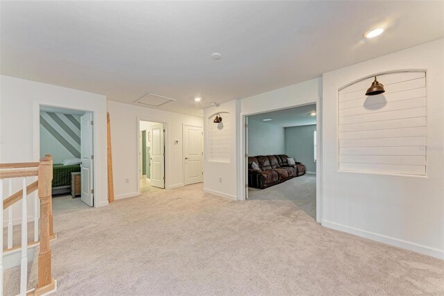 empty room featuring light colored carpet