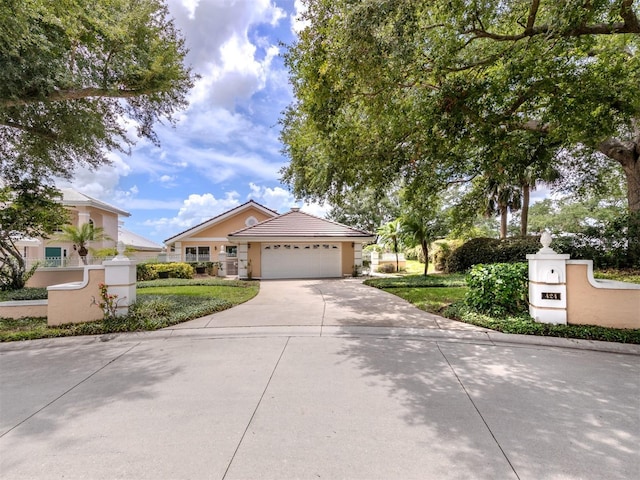 view of front of home with a garage