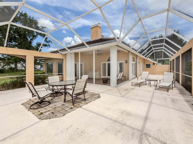 unfurnished sunroom featuring a swimming pool and vaulted ceiling