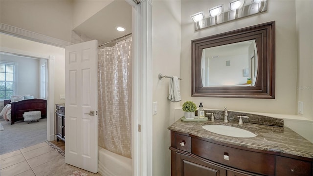 bathroom with vanity, tile patterned flooring, and shower / tub combo