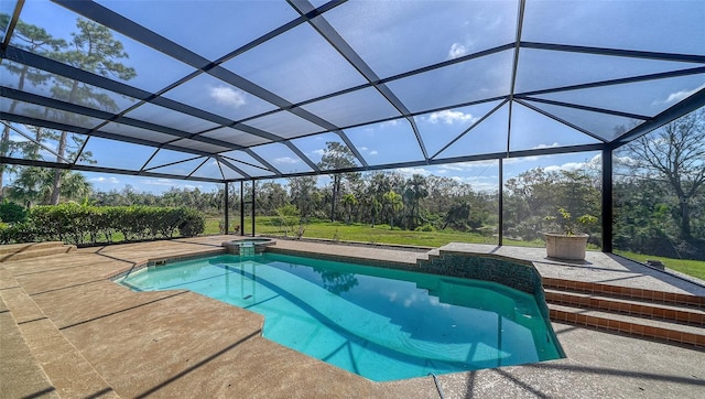 view of pool with an in ground hot tub, a patio, and a lanai