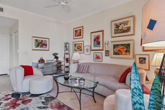 living room featuring ceiling fan and crown molding