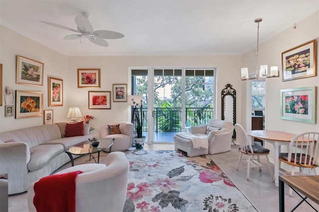 tiled living room featuring crown molding and ceiling fan with notable chandelier