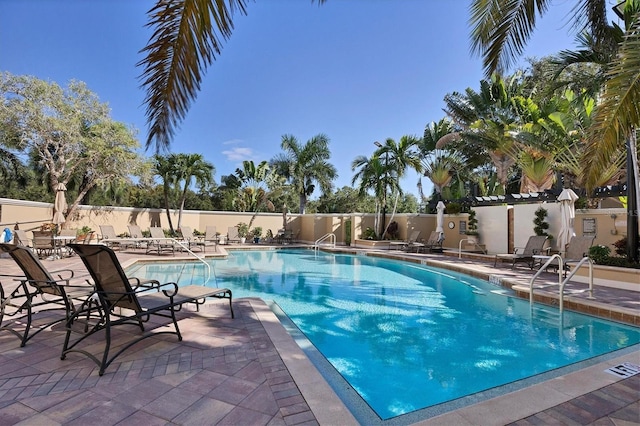 view of pool featuring a patio