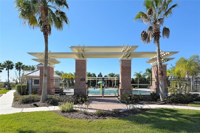 surrounding community featuring a pergola and a pool