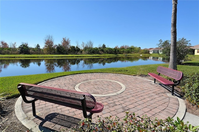 view of patio / terrace with a water view