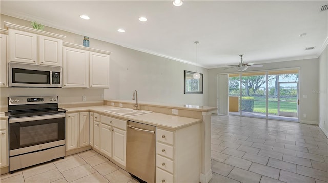 kitchen featuring kitchen peninsula, sink, light tile patterned flooring, and stainless steel appliances