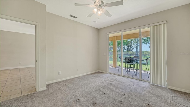 empty room with light carpet and ceiling fan