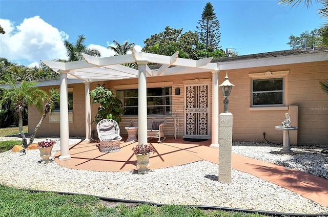 view of patio / terrace featuring a pergola