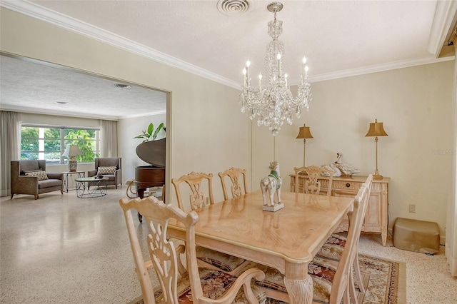 dining room featuring a notable chandelier, crown molding, and a textured ceiling