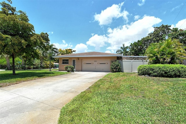 view of front facade with a garage and a front yard