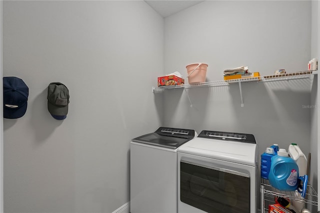 laundry room with separate washer and dryer