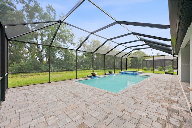 view of pool with a yard, a lanai, an in ground hot tub, and a patio area