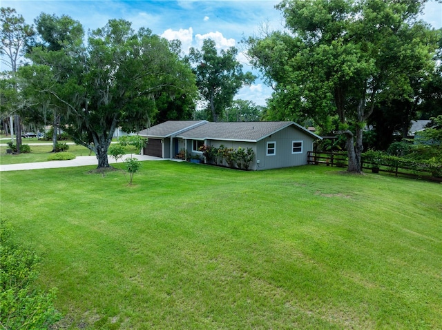 view of yard featuring a garage