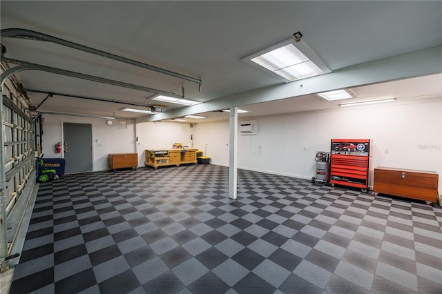 garage featuring a wall unit AC