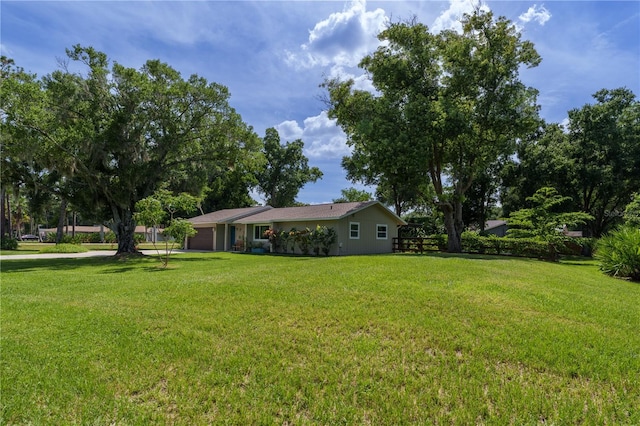 view of yard with a garage