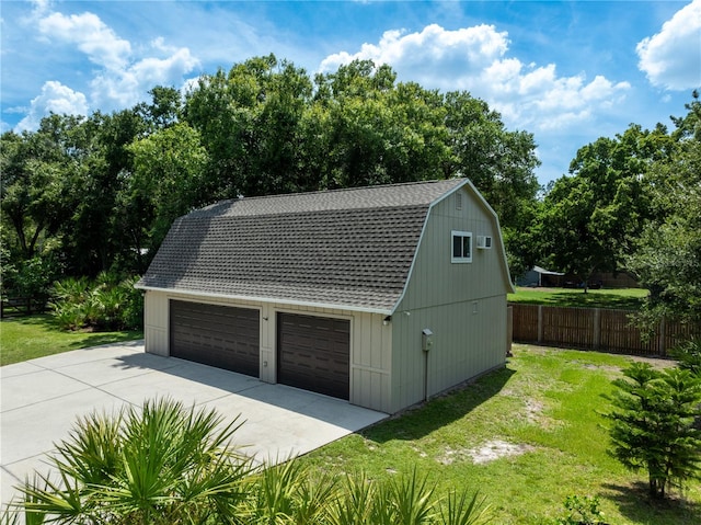 garage with a lawn