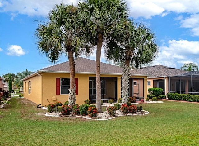 view of front of home with a front lawn