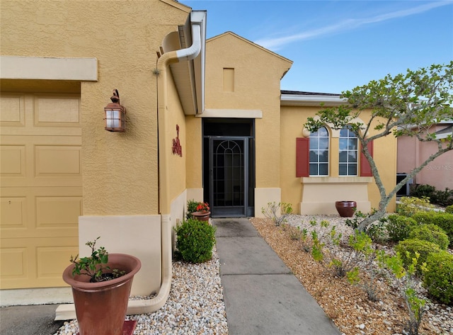 property entrance featuring a garage