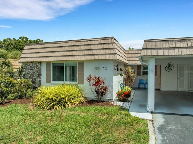 exterior space with a front lawn