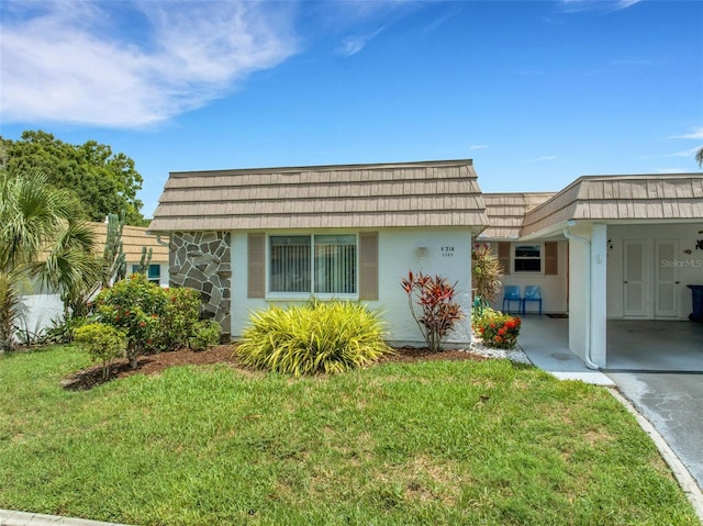 exterior space with a lawn