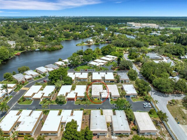 birds eye view of property featuring a water view