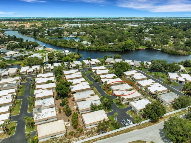 birds eye view of property featuring a water view