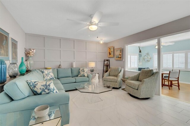 living room with ceiling fan