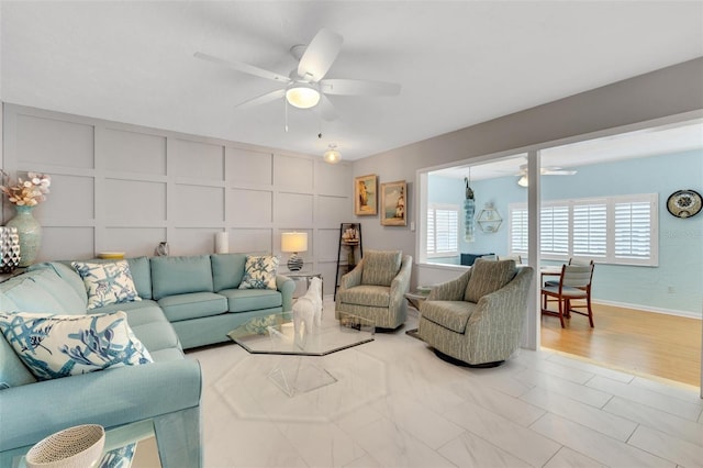 living room with ceiling fan