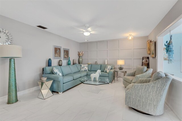 living room with ceiling fan