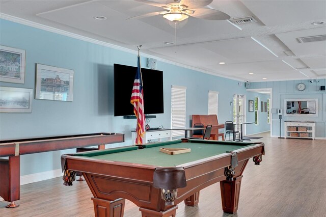 game room featuring ceiling fan, light hardwood / wood-style floors, and ornamental molding