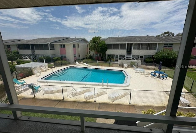 view of pool featuring a patio area