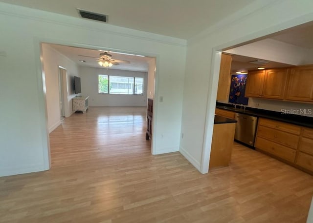 kitchen featuring dishwasher, light hardwood / wood-style flooring, ceiling fan, and ornamental molding