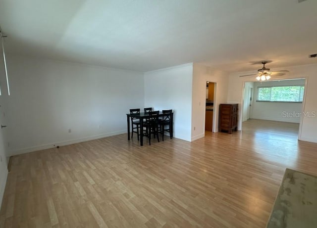 interior space featuring ceiling fan and light hardwood / wood-style floors