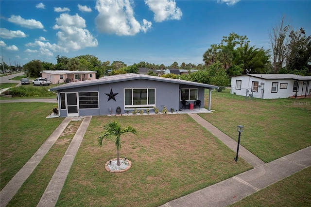 view of front of house with a front lawn