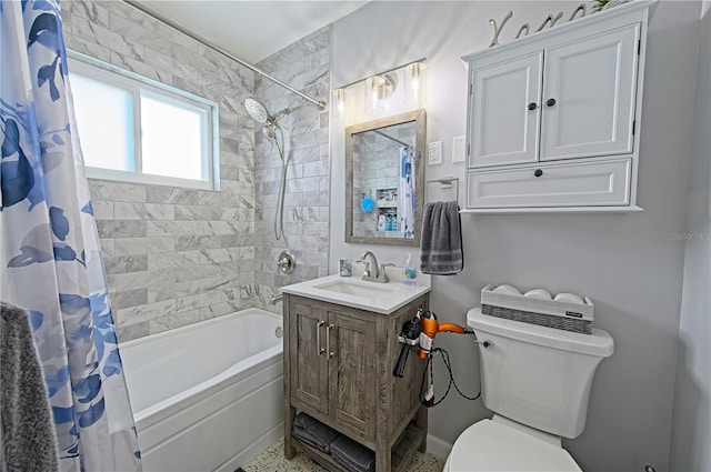 full bathroom featuring vanity, shower / bath combination with curtain, and toilet