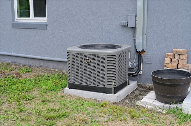 exterior details featuring cooling unit