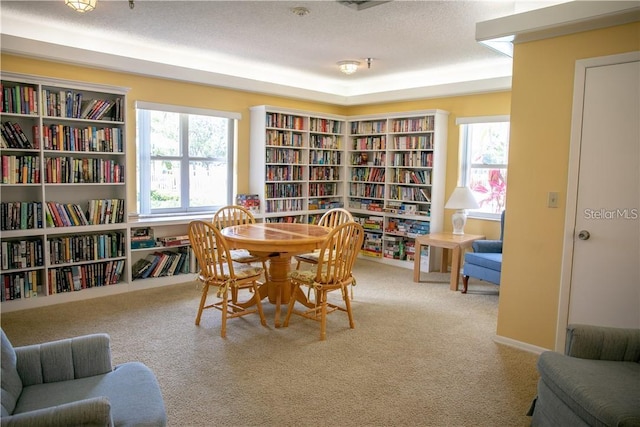 4410 Fairways Blvd Unit 602, Bradenton, FL 34209 - carpeted dining area with a textured ceiling